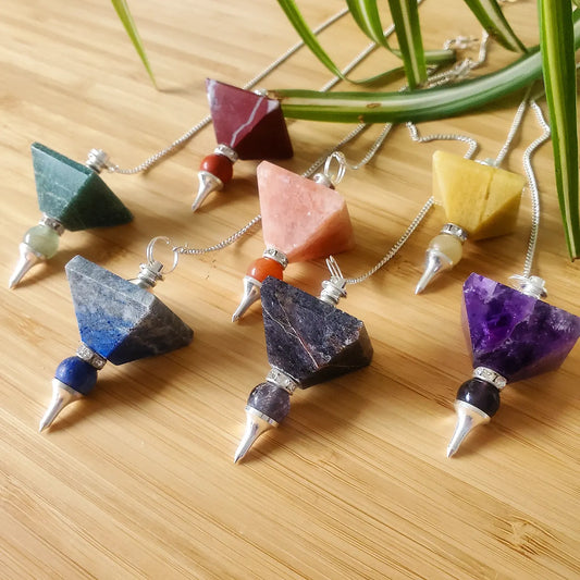 Chakra pendulum set, stone pyramid and sphere pairs