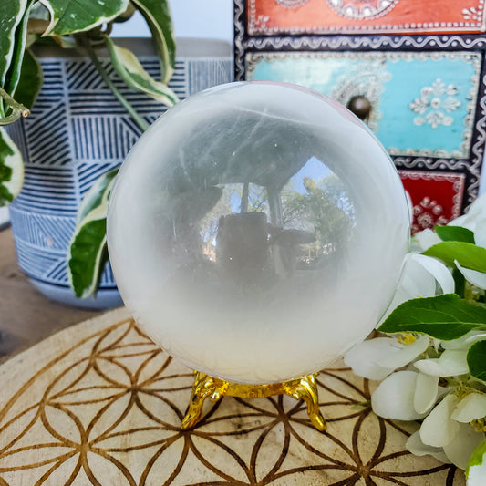 Large selenite sphere, white glowing crystal ball