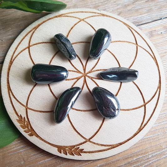 Polished hematite stones, metallic silver-grey crystal