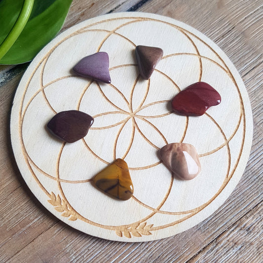 Tumbled mookaite jasper, swirling red yellow cream pattern