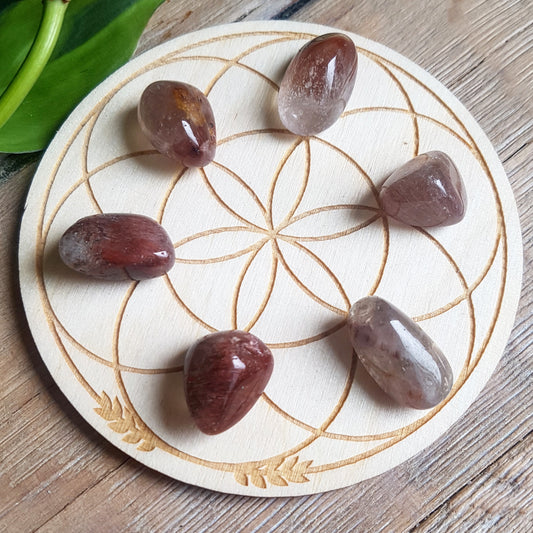Red rutilated quartz, clear crystal with copper rutile threads