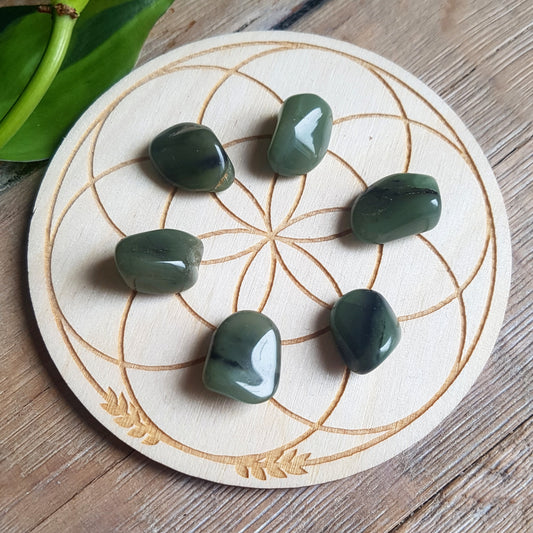 Green chalcedony tumbled stones, soft translucent green crystal