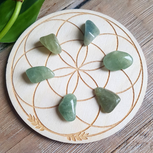 Green beryl tumbled stones, natural green crystal from Brazil